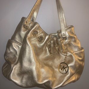 Michael Kors gold satchel